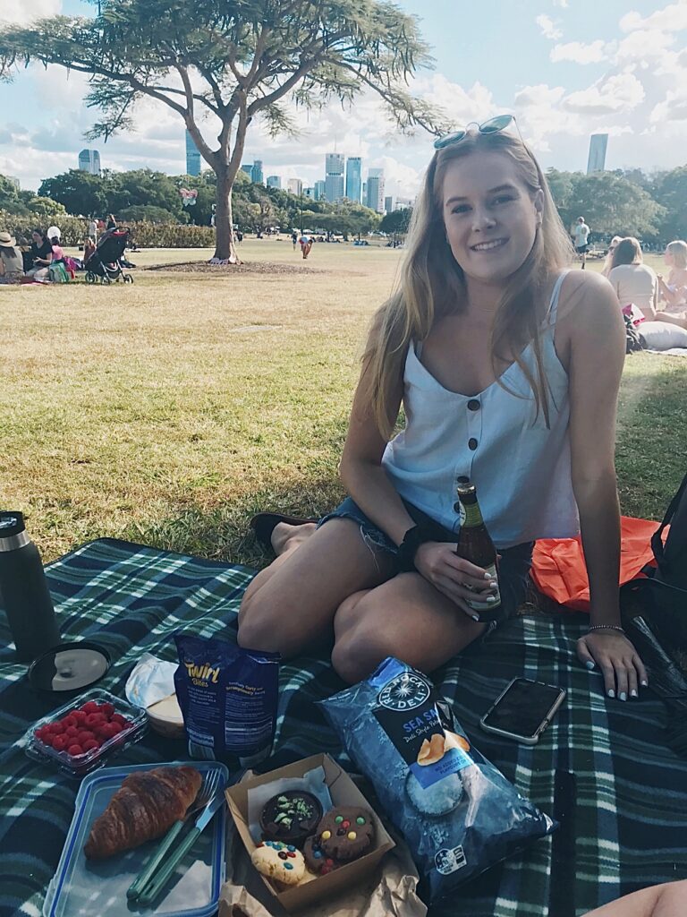 Having a picnic in the park is a great way to budget travel