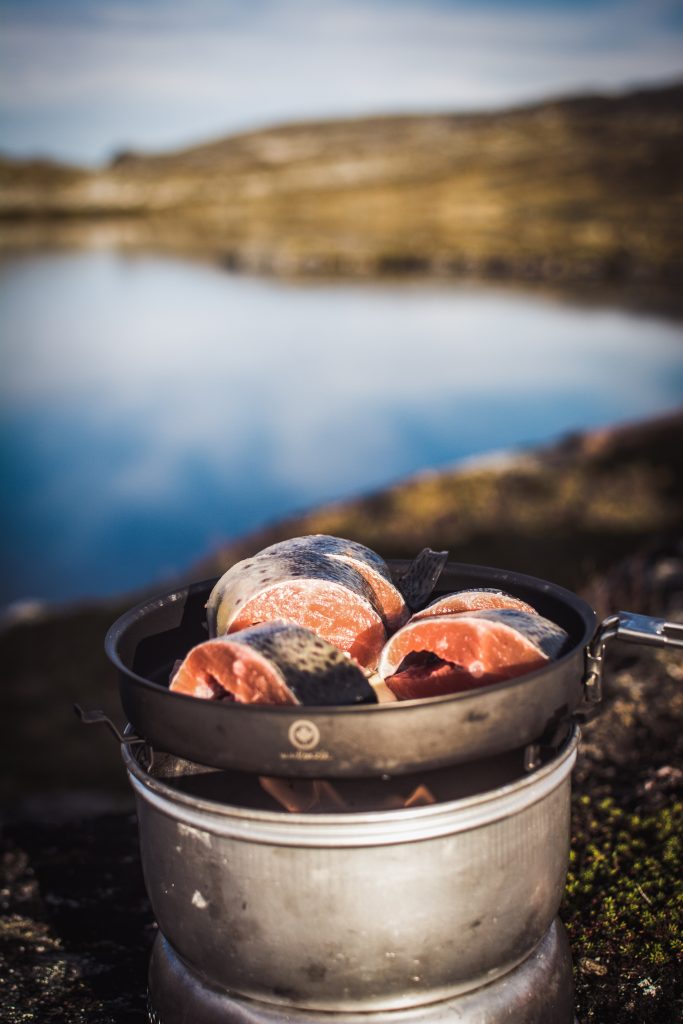 Cook a delicious meal on a camping trip with your boyfriend or girlfriend