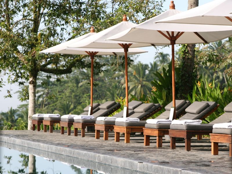 Hotel pool chairs by the pool in Ubud Bali