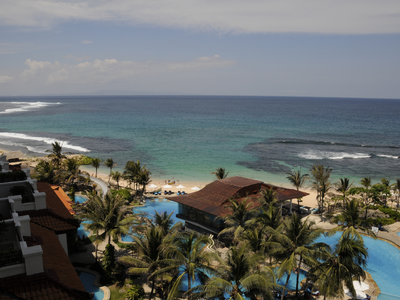 Aerial beachfront view of one of the best hotels in Canggu
