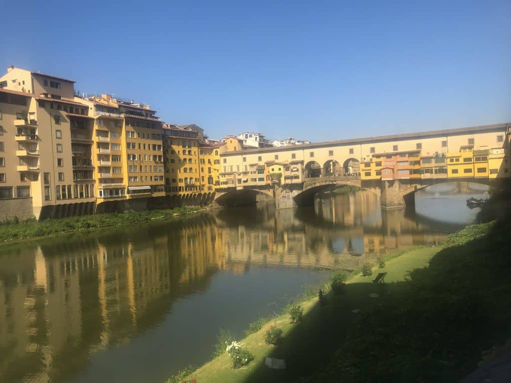 The Arno River at sunset is the perfect place for a romantic stroll to view the city in a new light