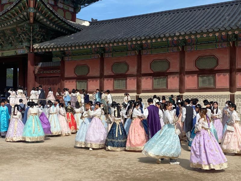 Girls wearing Hanboks in front of Gyeongbokgung Palace Seoul