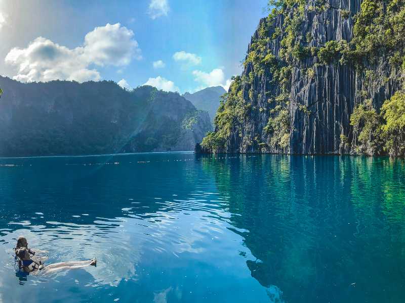Palawan with it's bright blue waters and limestone cliffs is a great place to visit for beach lovers